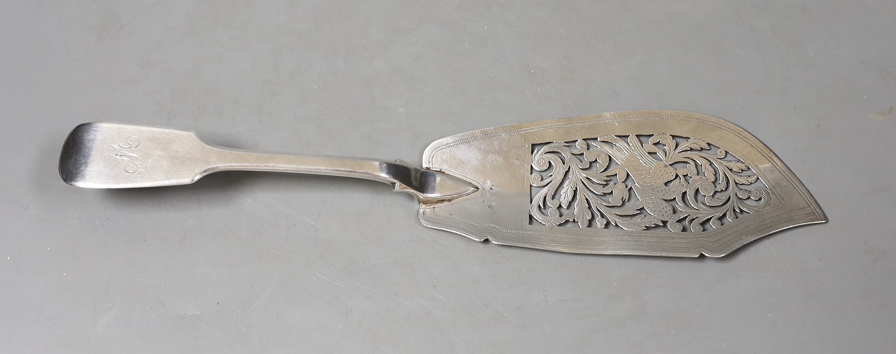 A William IV silver fiddle pattern fish slice, William Eaton, London, 1830, 28.5cm, 114 grams.